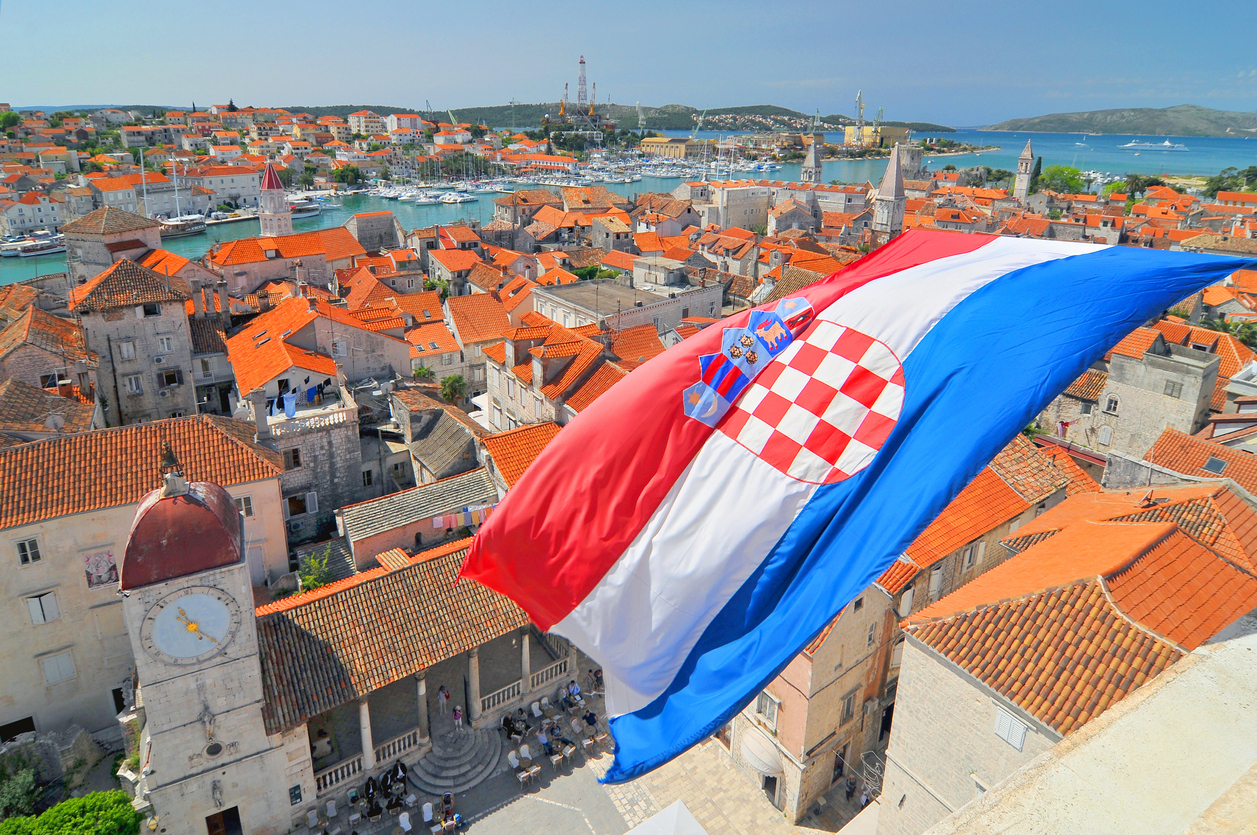 Flag and view on Trogir from Cathedral of Saint Lawrence, Croatia