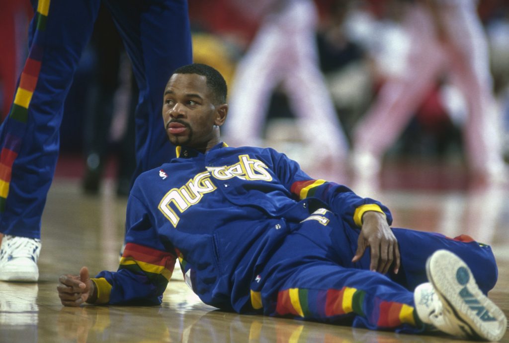 Denver Nuggets guard Michael Adams stretching.