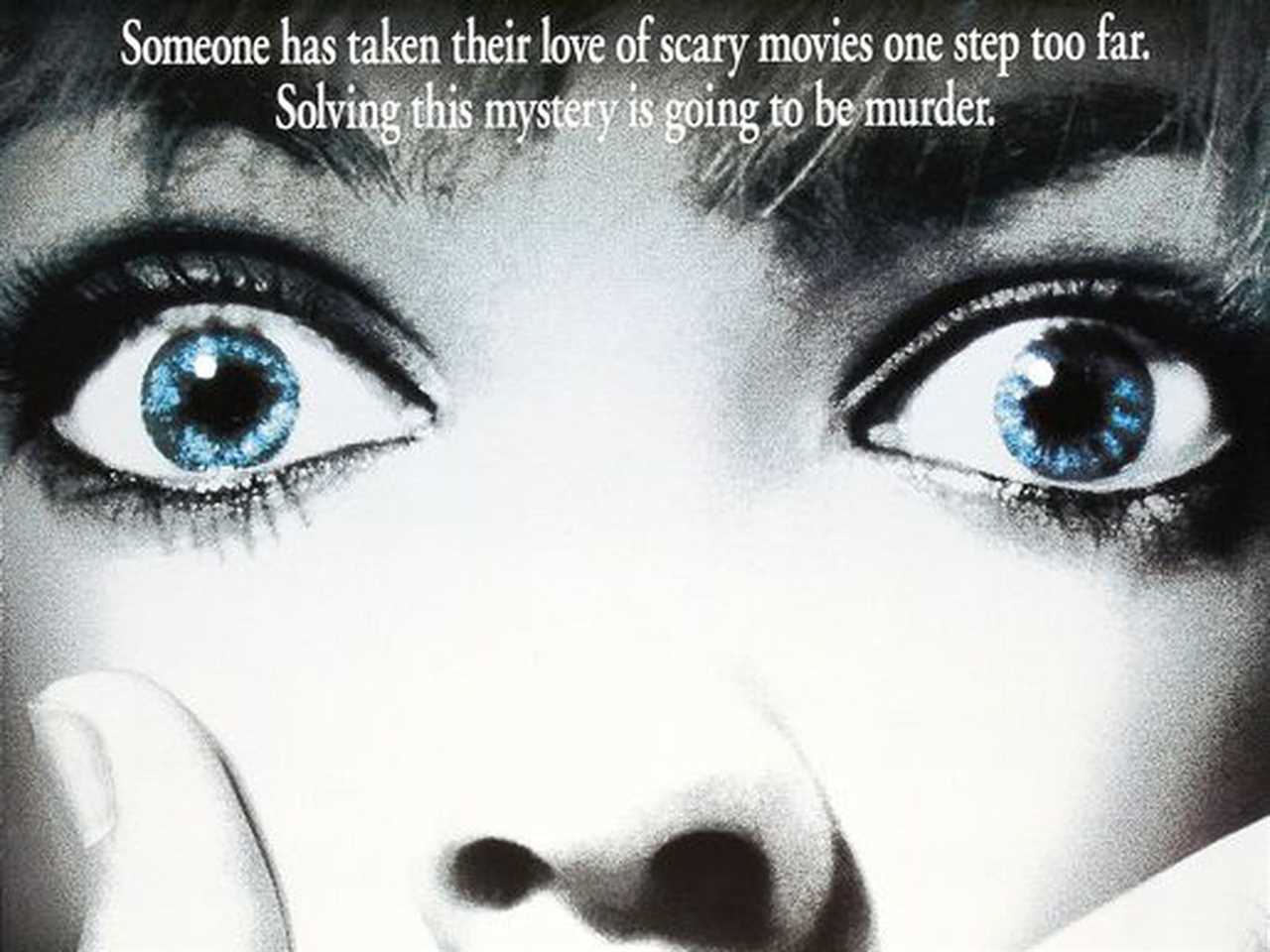 The poster for the movie “Scream” features a close-up of a face with a hand over the mouth.