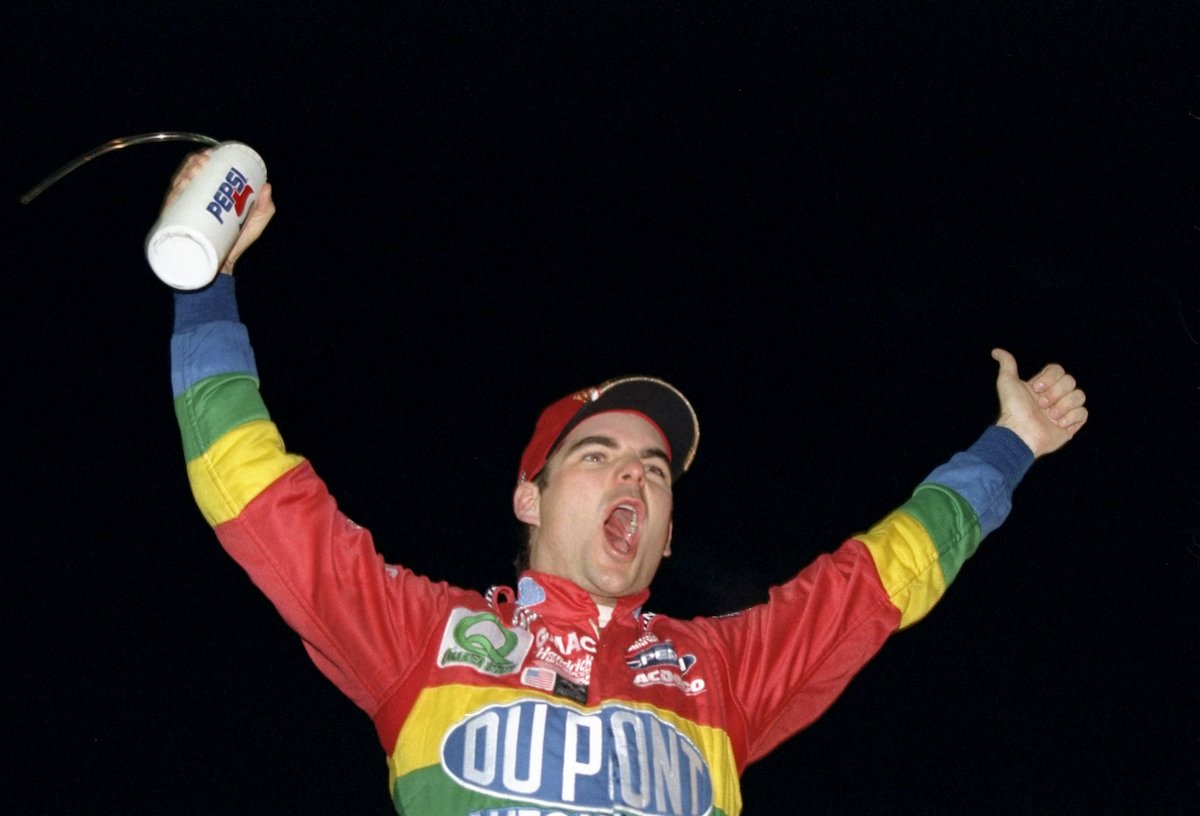 Jeff Gordon celebrates during the NASCAR Napa 500 at the Atlanta Motor Speedway in Hampton, Georgia, in Novermber 1998