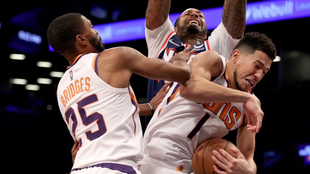 Devin Booker is doing his share of the dirty work for the Phoenix Suns, who have the NBA's longest winning streak this season up to 16 games.