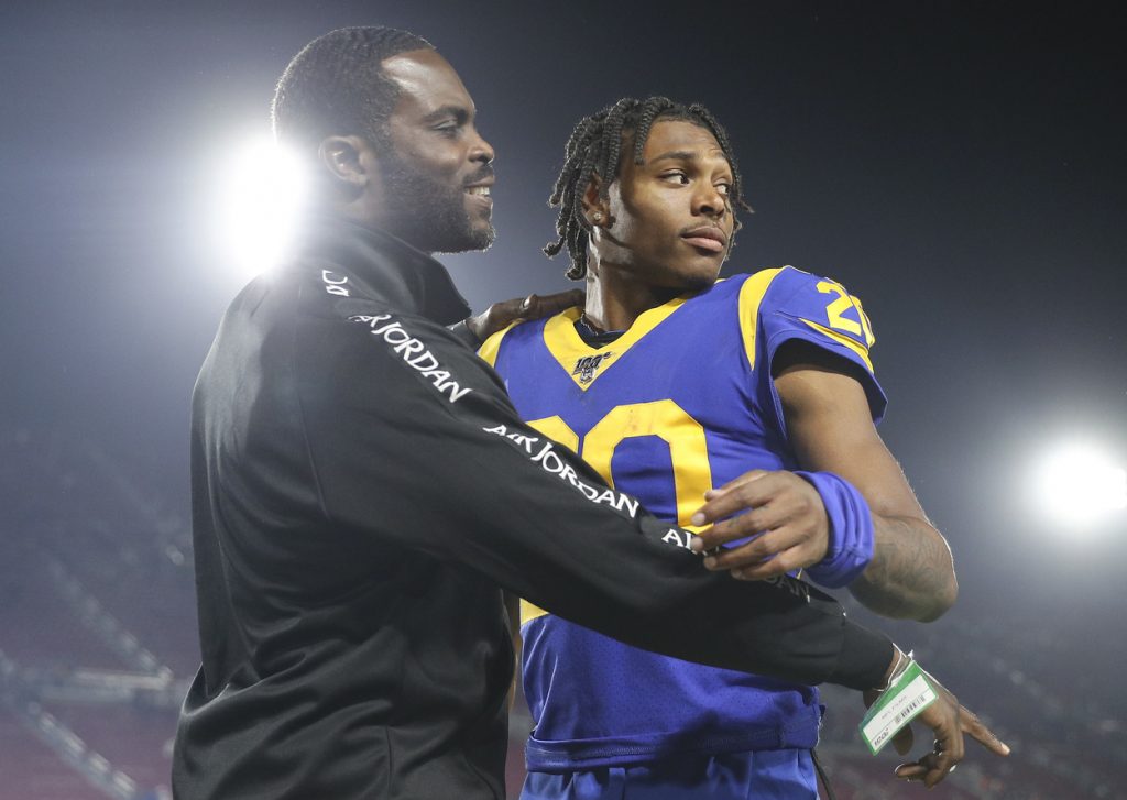 Michael Vick (L) and Los Angeles Rams cornerback Jalen Ramsey in 2019.