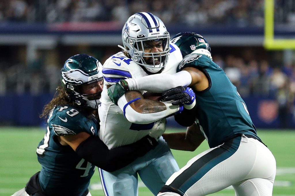 Dallas Cowboys running back Ezekiel Elliott runs against the Philadelphia Eagles in 2021.