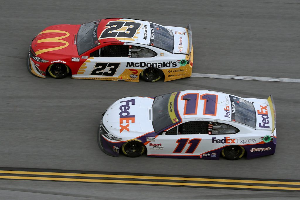 Denny Hamlin and Bubba Wallace race at Talladega