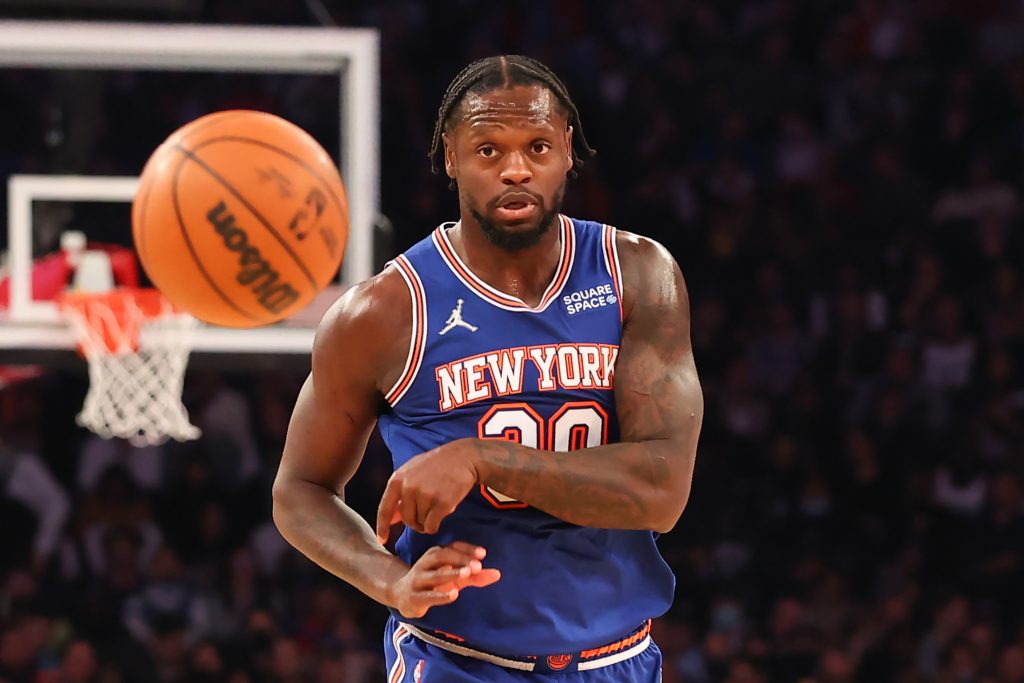 New York Knicks forward Julius Randle passes the ball during an NBA game against the Memphis Grizzlies