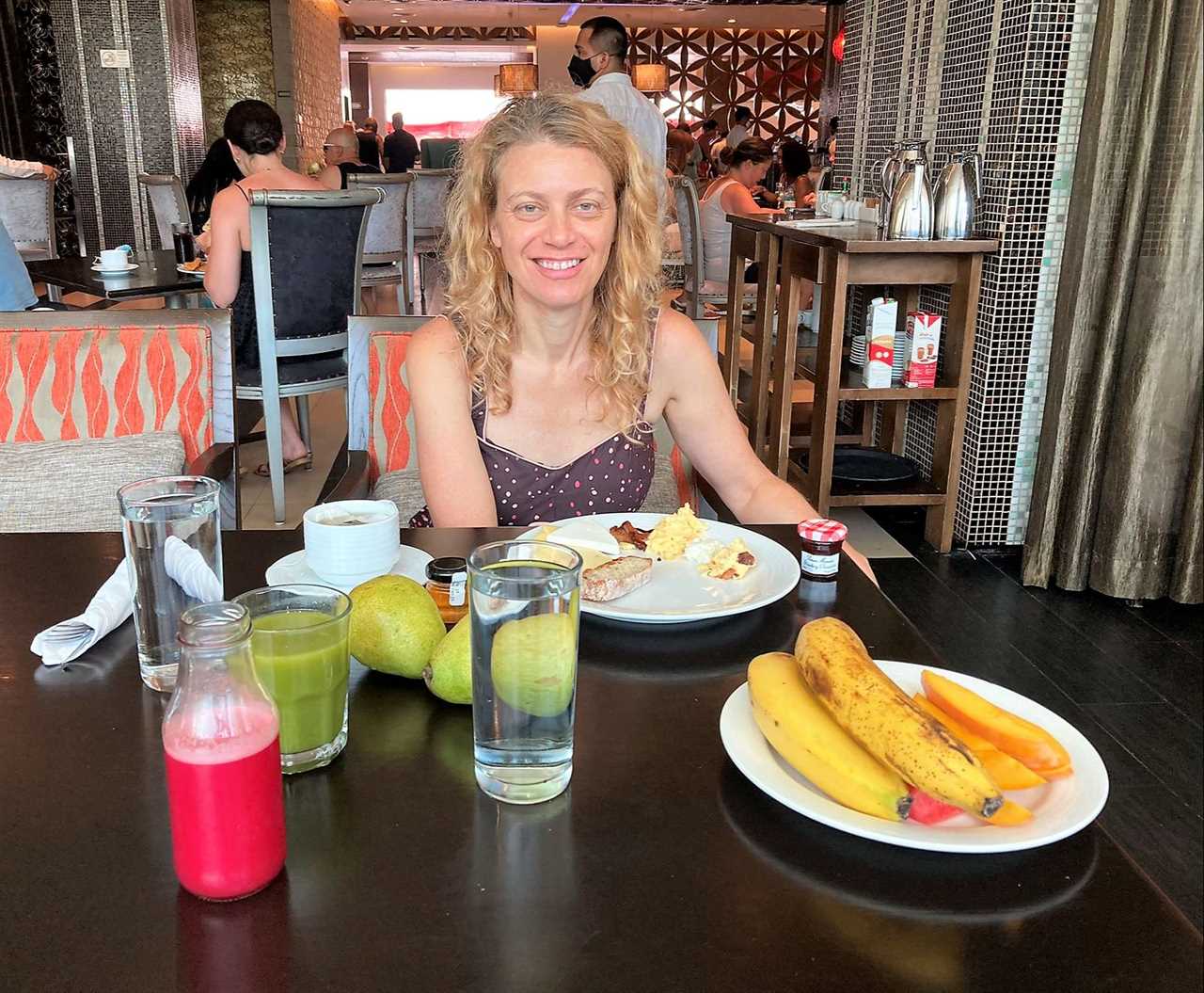 woman having a brunch on a bottomless buffet