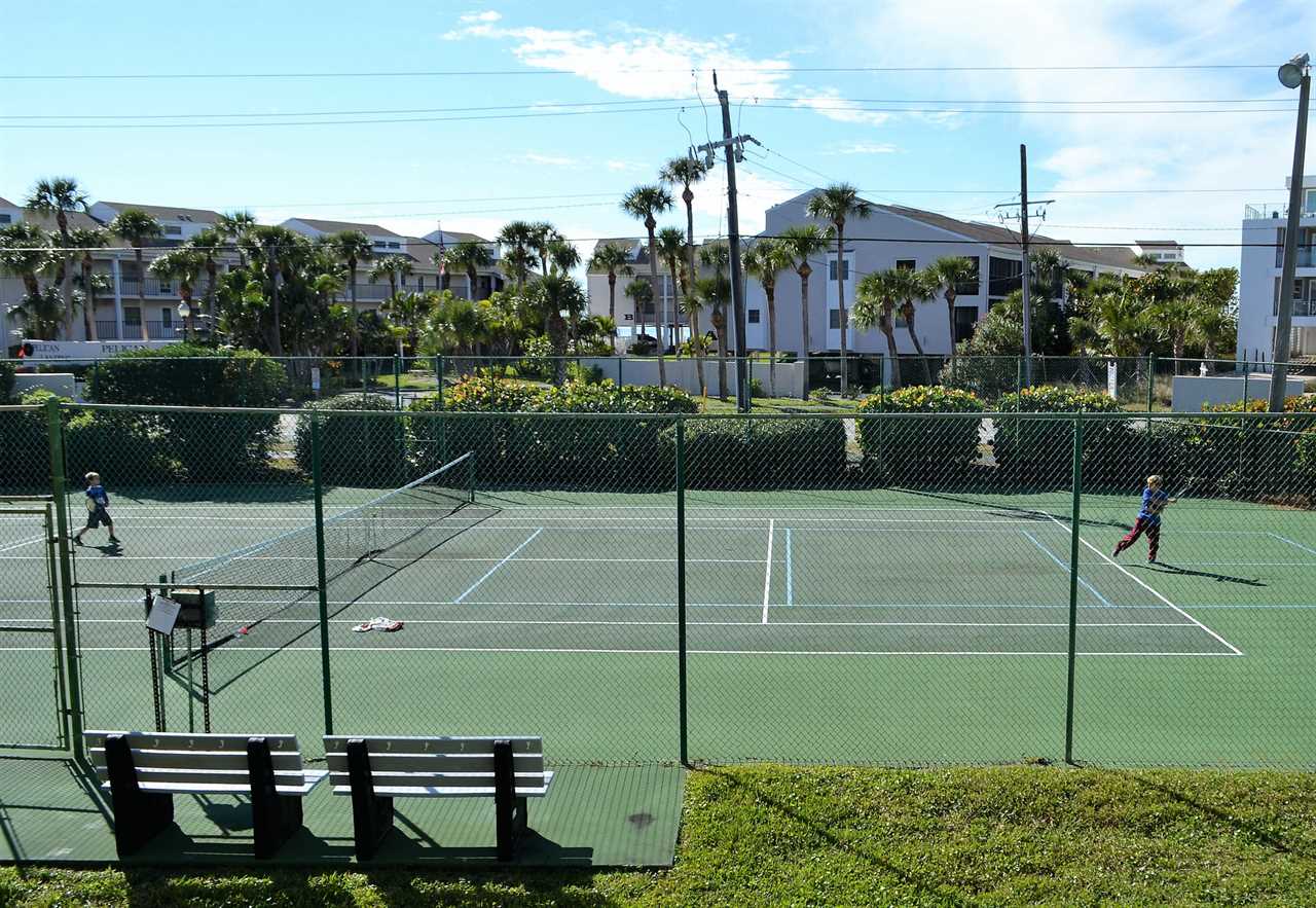 Playing tenis at Pelican Landing manasota key fl