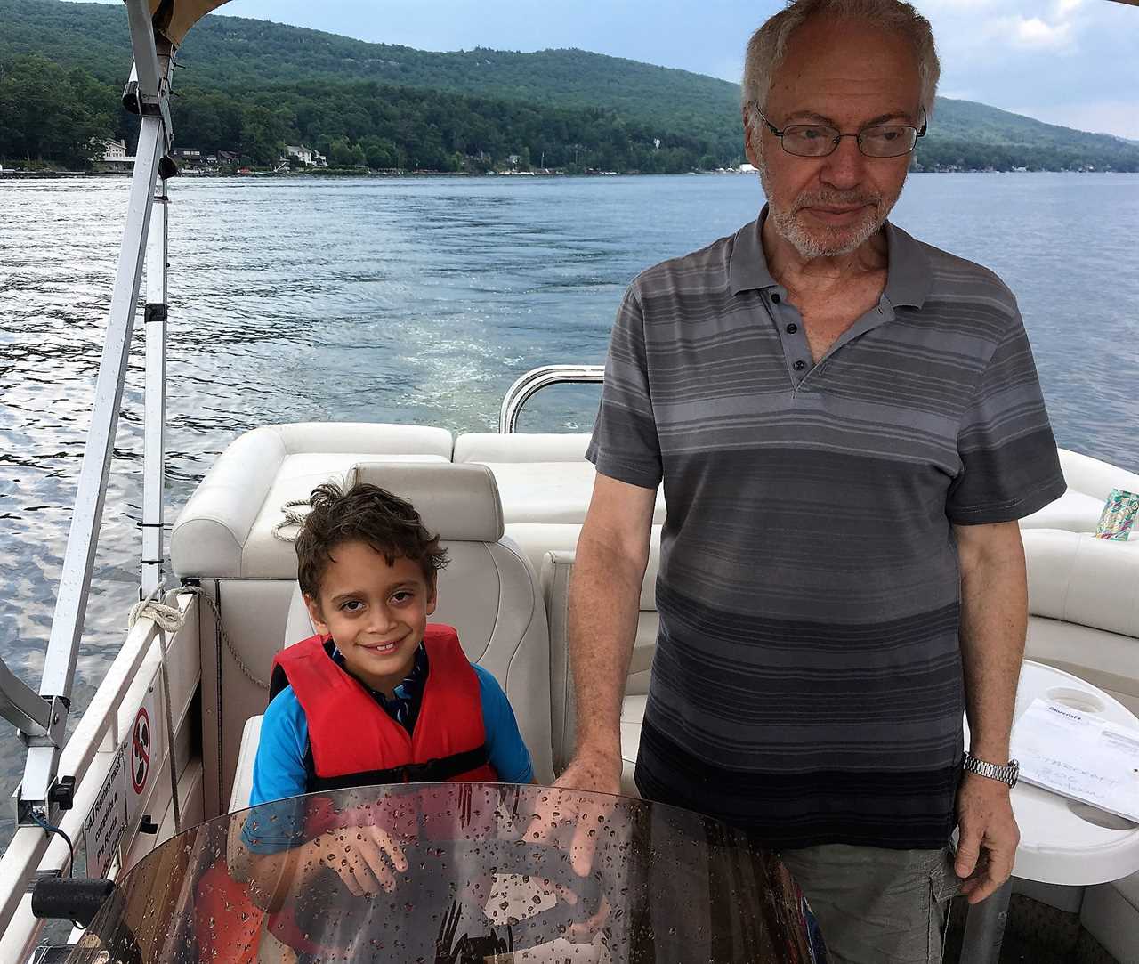  co-captain with grandpa on a greenwood lake ny boat rental 