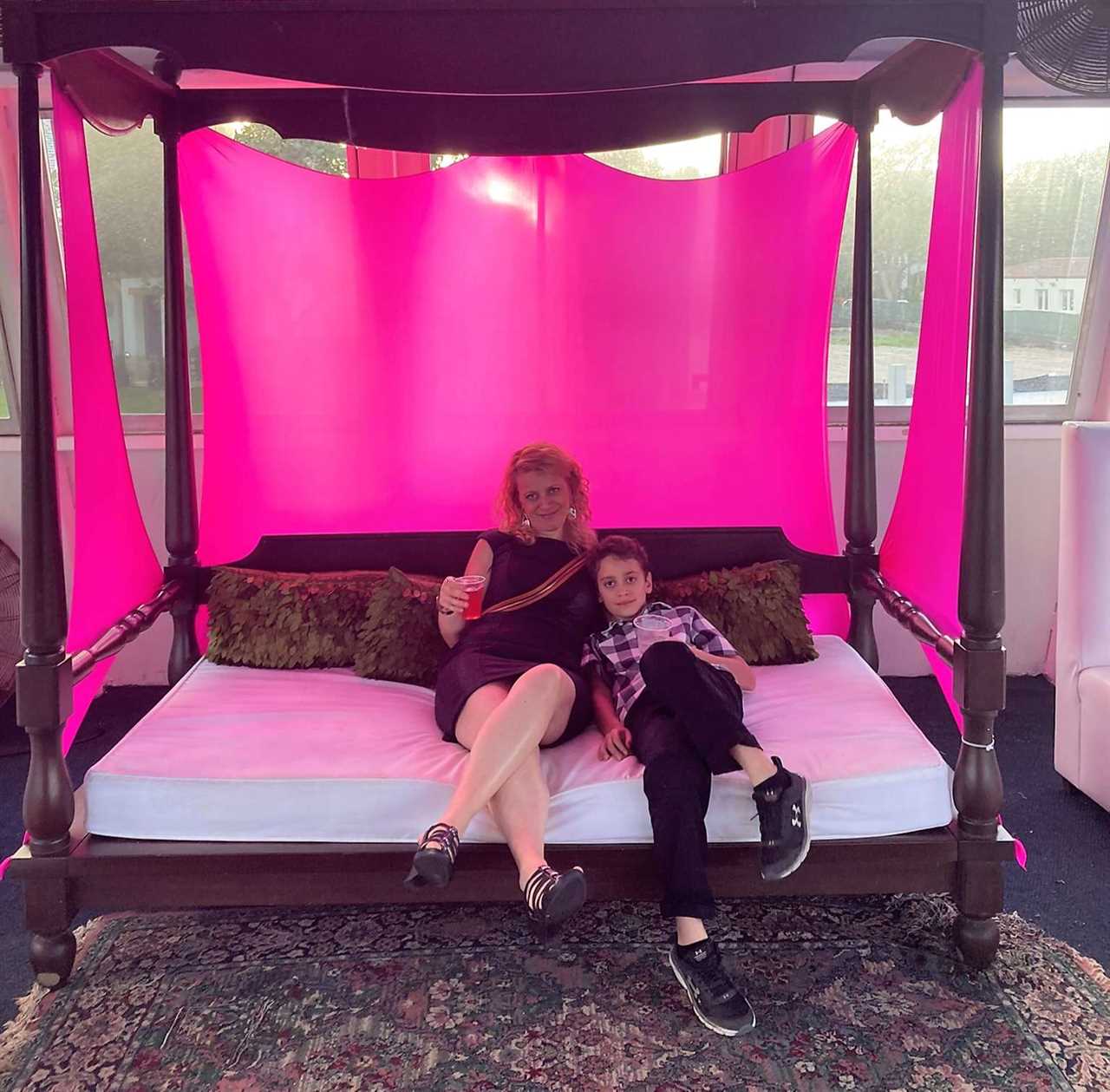 woman and a kid sitting on lounge bed on a yacht in fort lauderdale