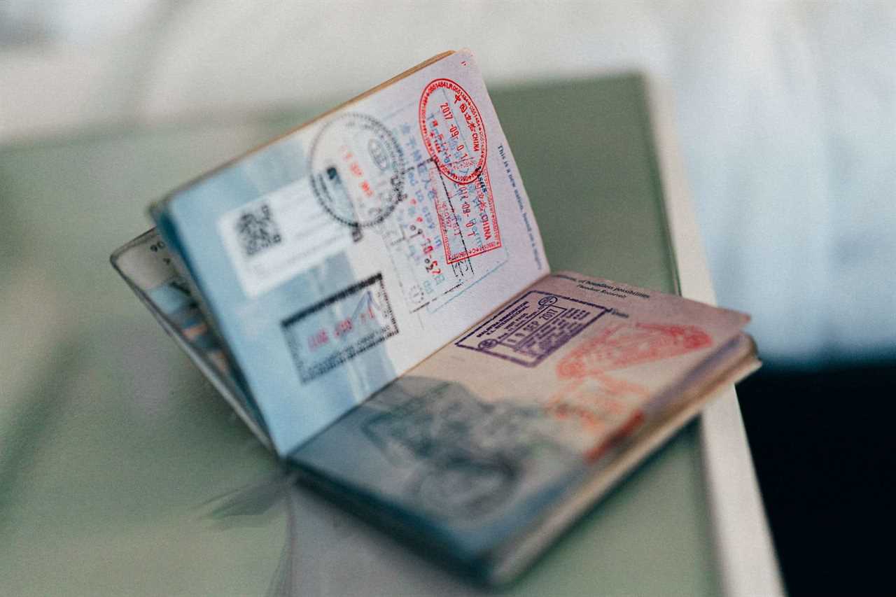 open passport on top of a desk
