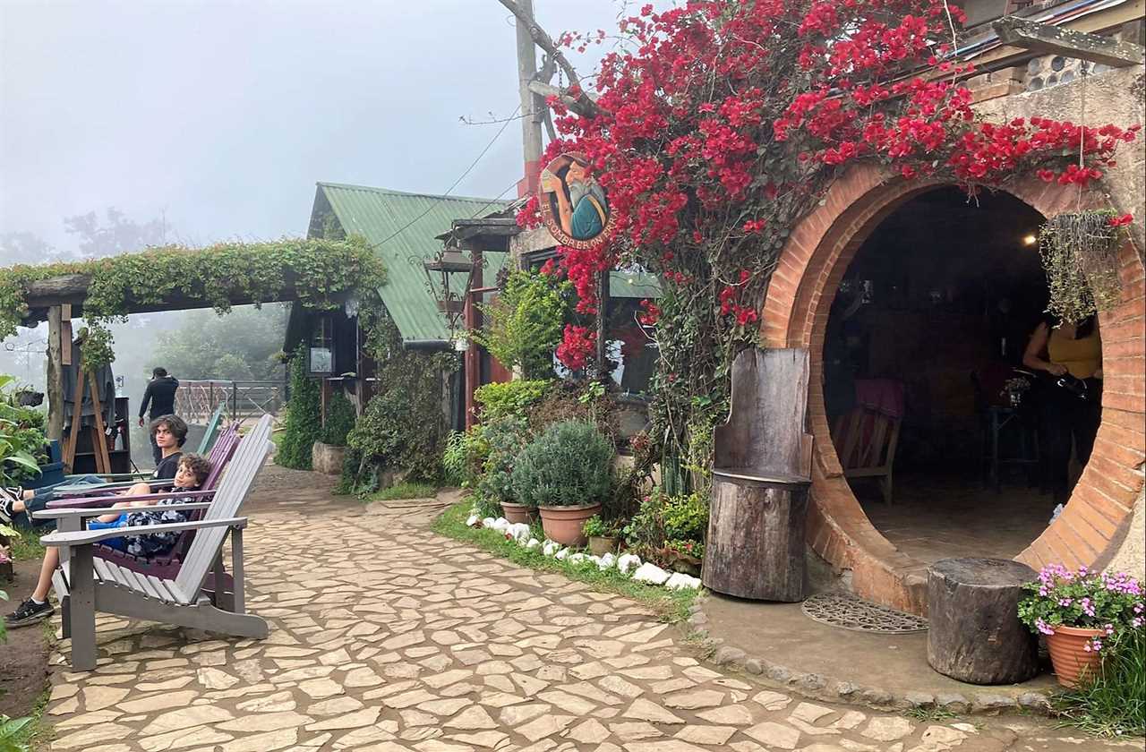 entrance to the hobbitenango restaurant in antigua guatemala