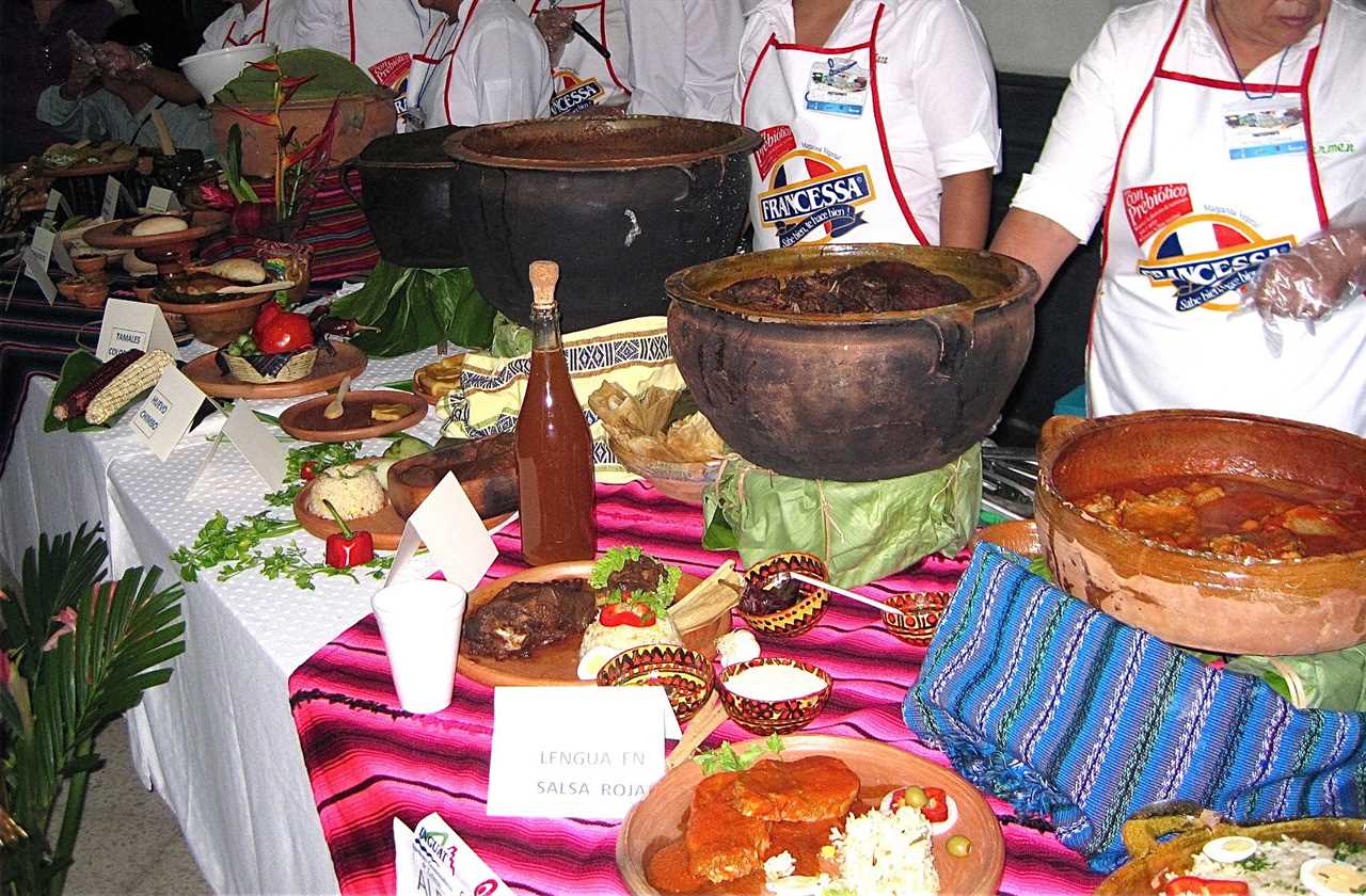 a table with lots of traditional guatemalan food