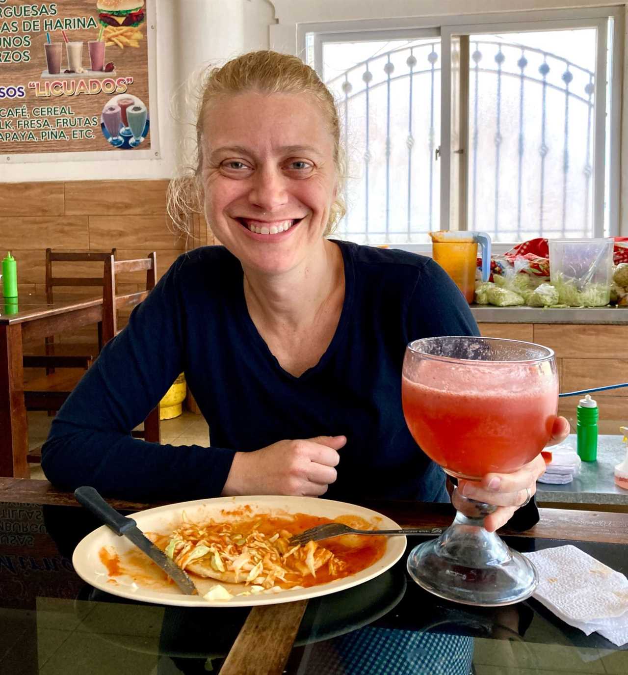 woman eating food in guatemala