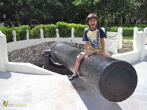 kid sitting in a cannon at cuba