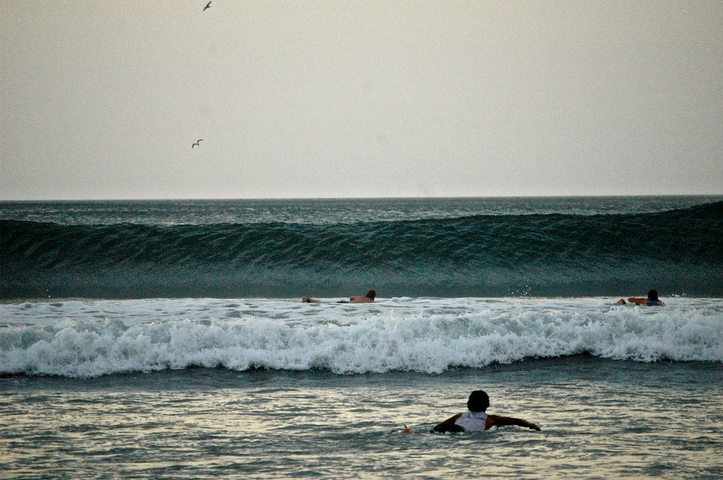 people surfing tamarindo beach costa rica