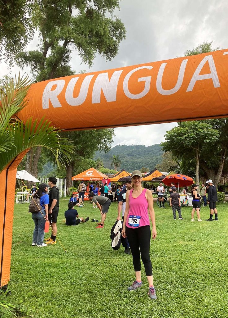 runguate and a woman under the sign