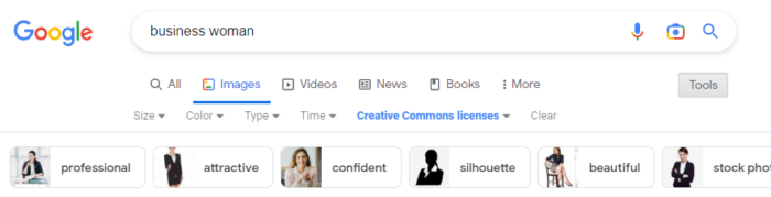 A screenshot of the Google search bar that has "business woman" typed in.