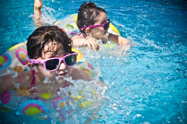 Two girls playing in the water