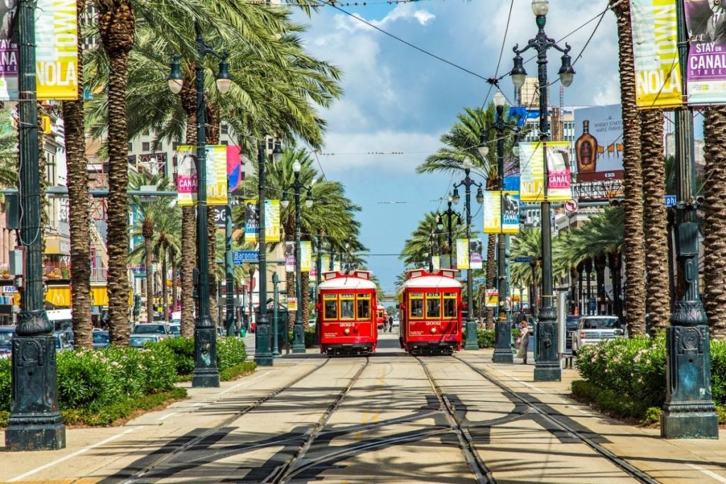 Red trolley streetcar on rail in New Orleans