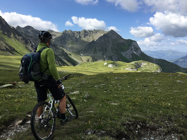 guy on a bike in a mountain