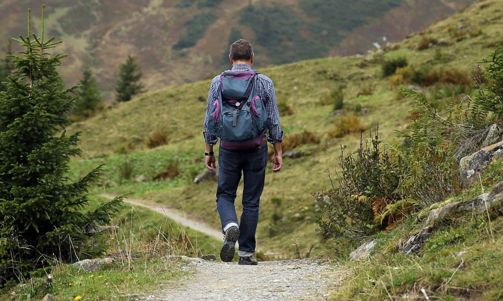 man hiking alone