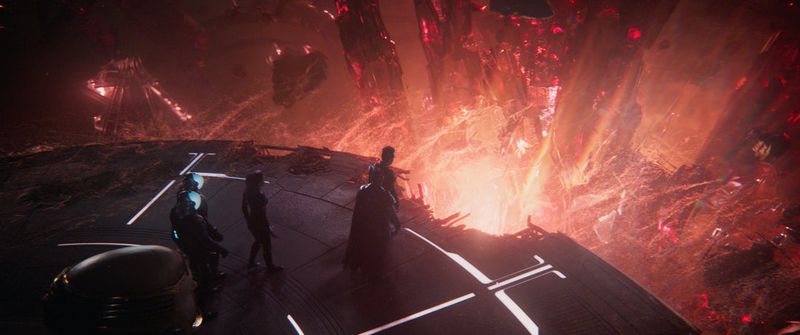 The characters in Quantumania interact with the quantum realm, depicted as filaments of glowing light.