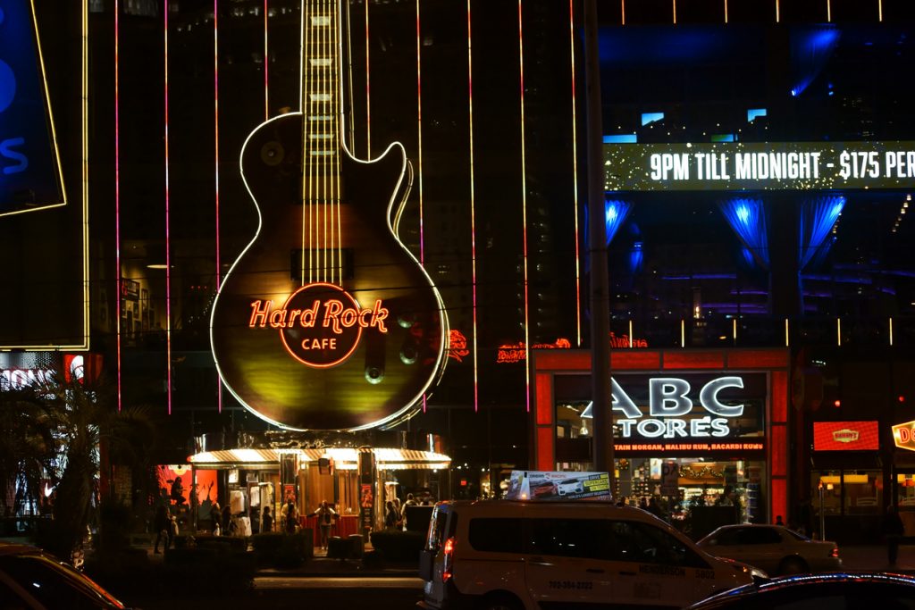 Road traffic and visitors in front of the lighted Hard Rock Cafe on the Las Vegas Boulevard in the night of December 23, 2015 in Las Vegas.