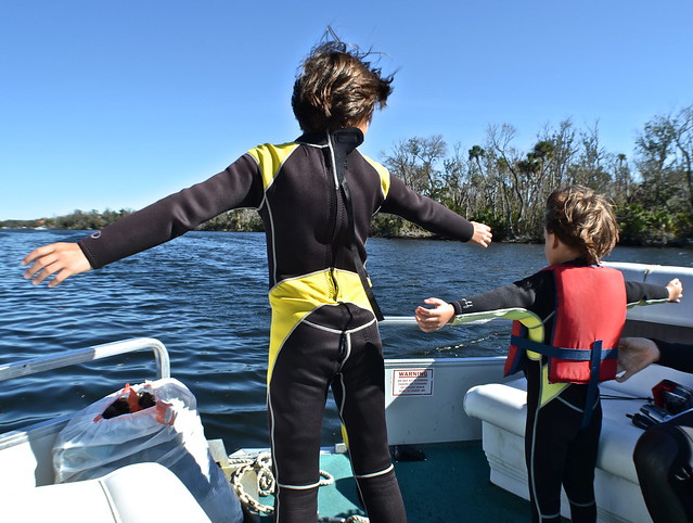 kid having fun at nature coast manatee tour