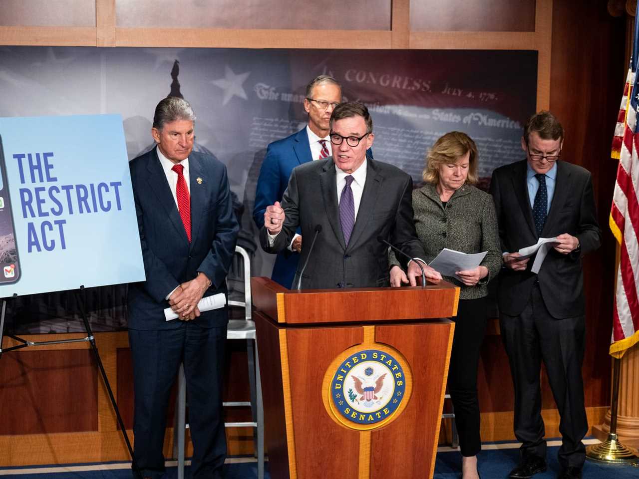 r-l Sens. Joe Manchin, John Thune, Mark Warner, Tammy Baldwin, and Michael Bennet.