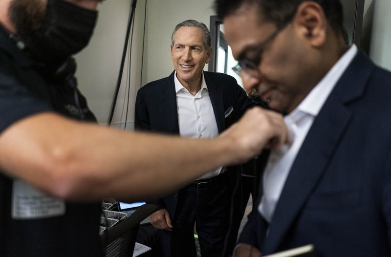 CEO of Starbucks Howard Schultz back stage with soon to be Starbucks CEO Laxman Narasimhan at Starbucks Headquarters during Investor Day in Seattle, Washington Tuesday September 13, 2022.