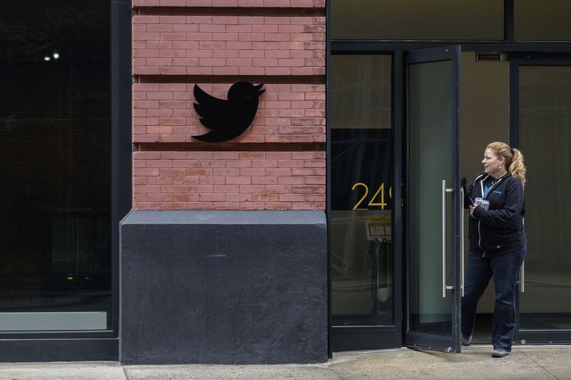 A woman outside Twitter’s office in New York City.