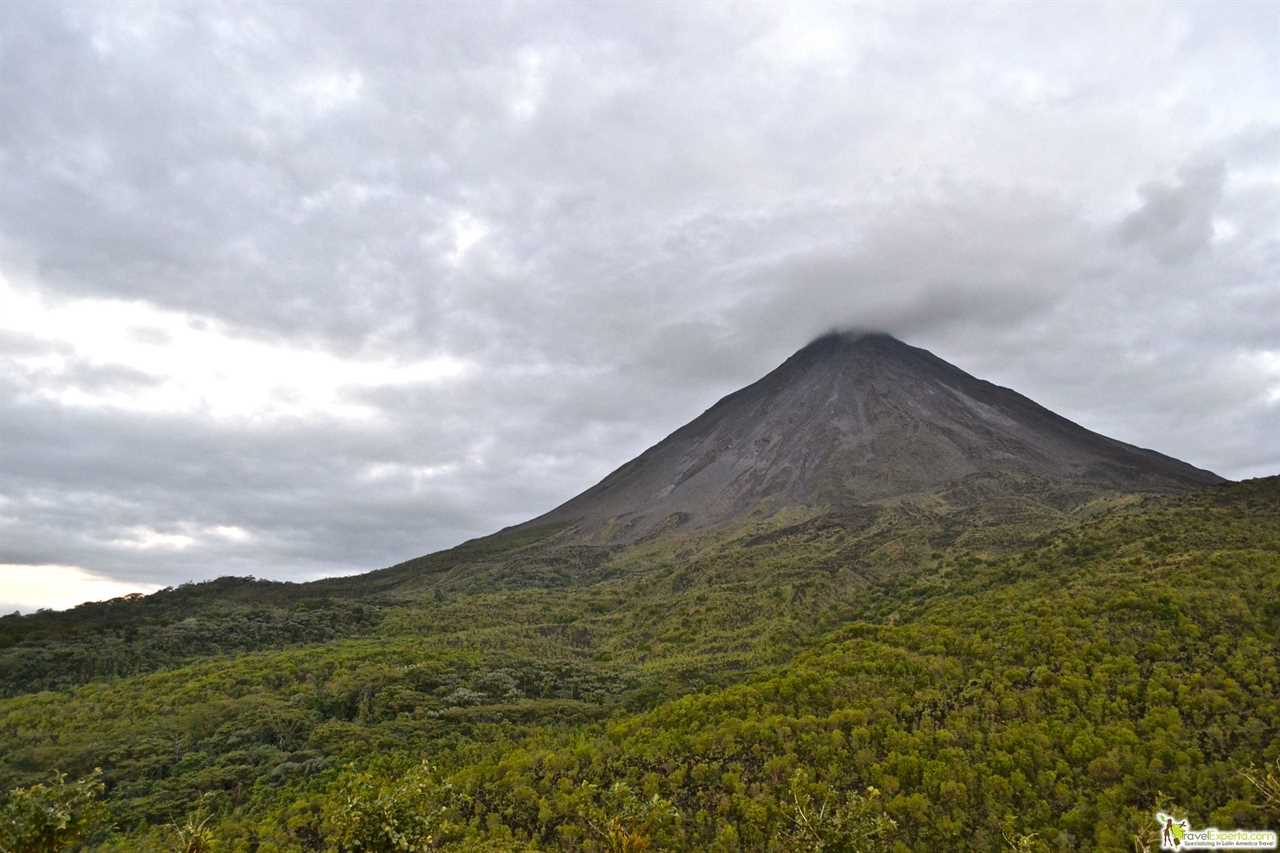 View of the clouds touching the top of Arenal volcano in Costa Rica