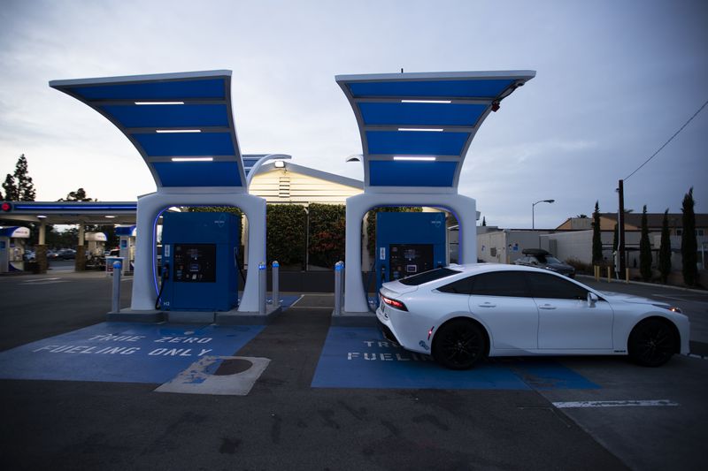 A car at a hydrogen fuel station.