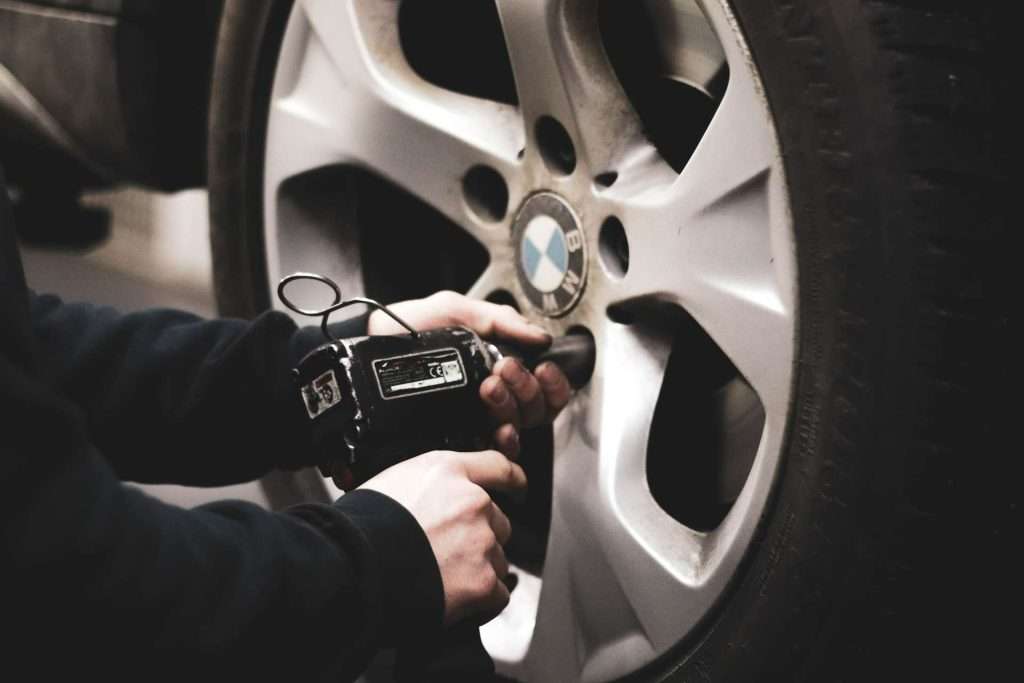 checking the tires to properly maintain your car