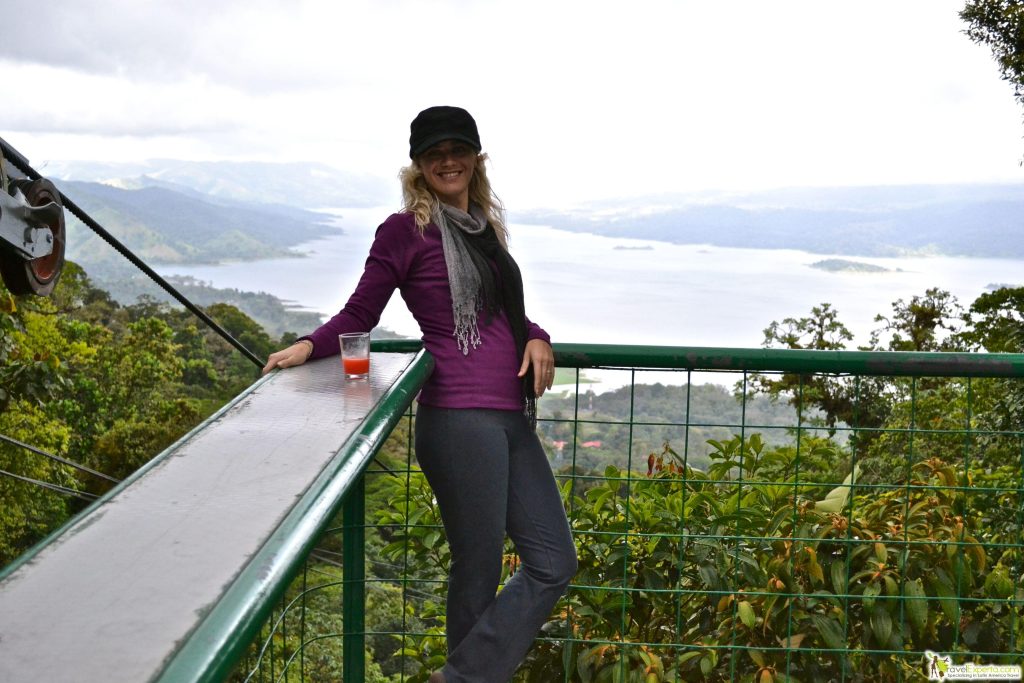 woman on top of a lookout mountain in costa rica