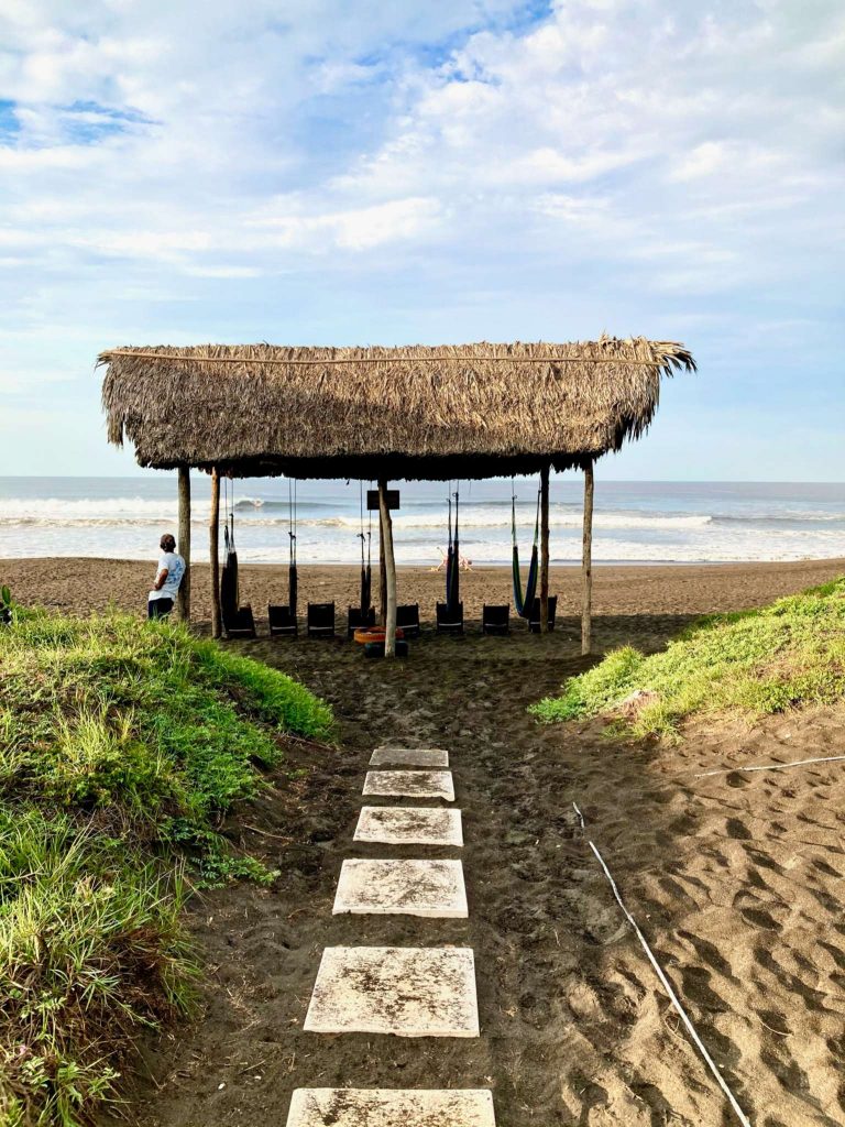 path and hut with hammocks el paredon beach