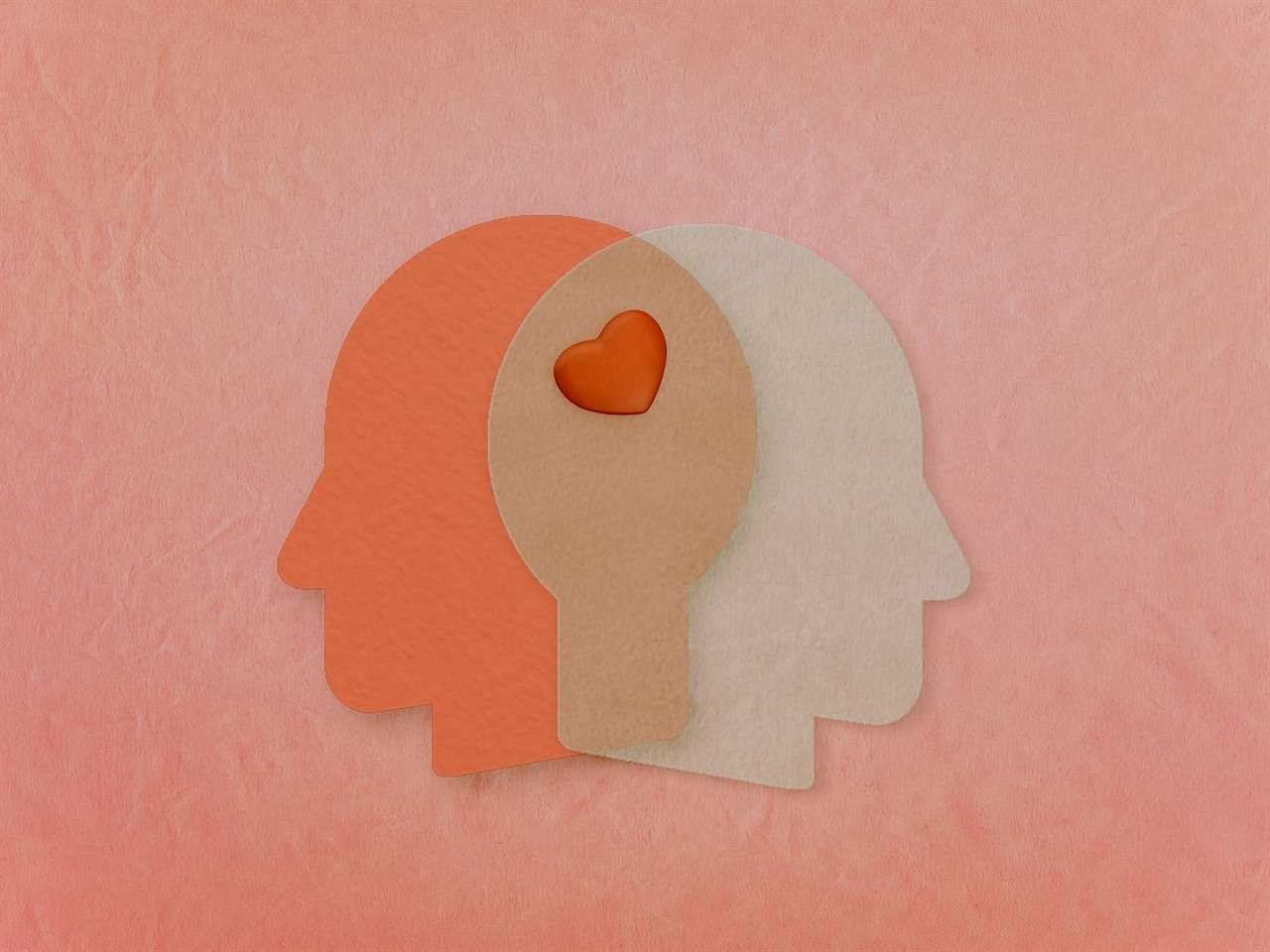 Two silhouetted heads cut out of paper lie on a pink background, facing away from each other and overlapping at the center. The left head is  orange and the right head is white. In the center where they overlap, there is a red heart cutout.