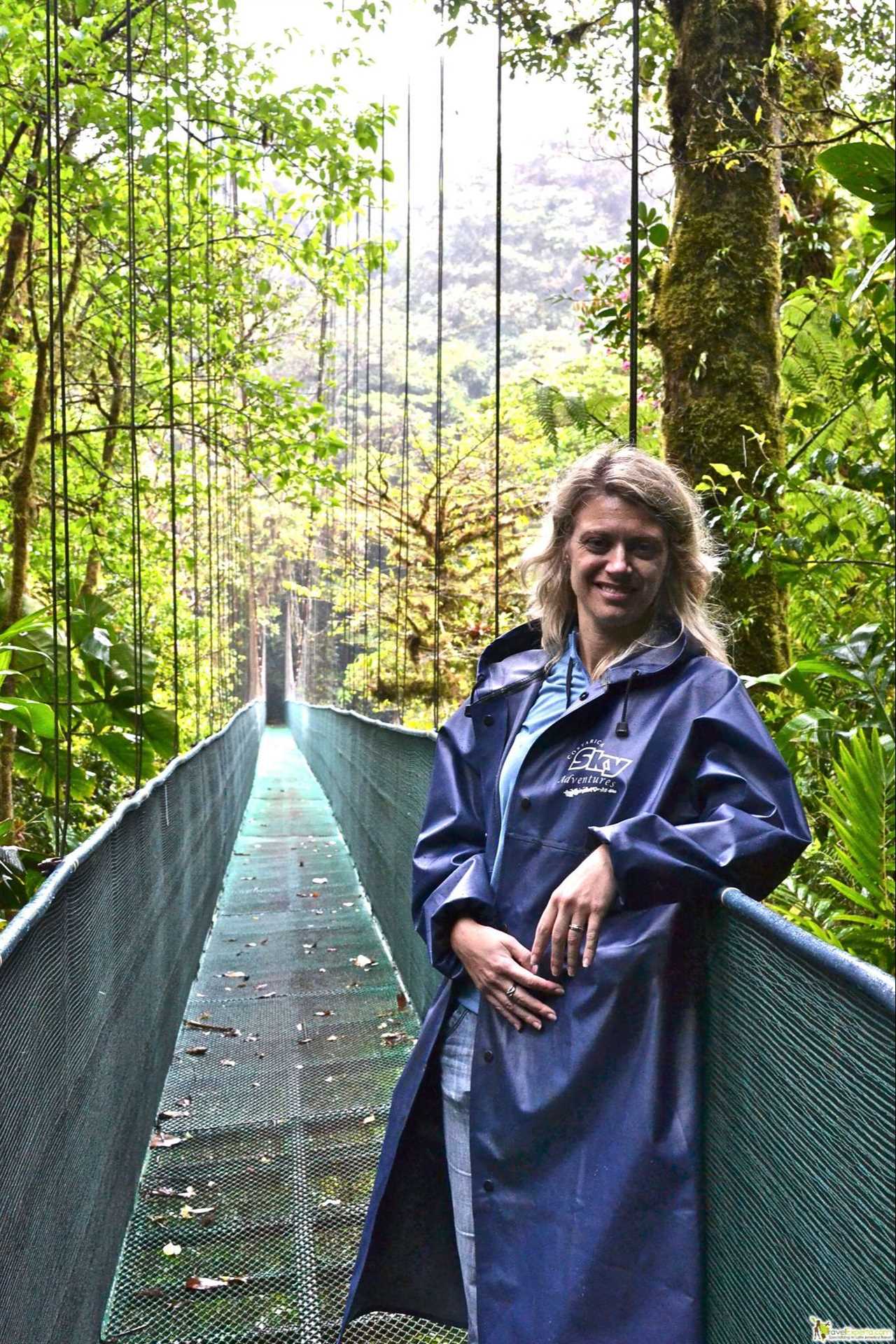 woman on a hanging bridge in monteverde costa rica