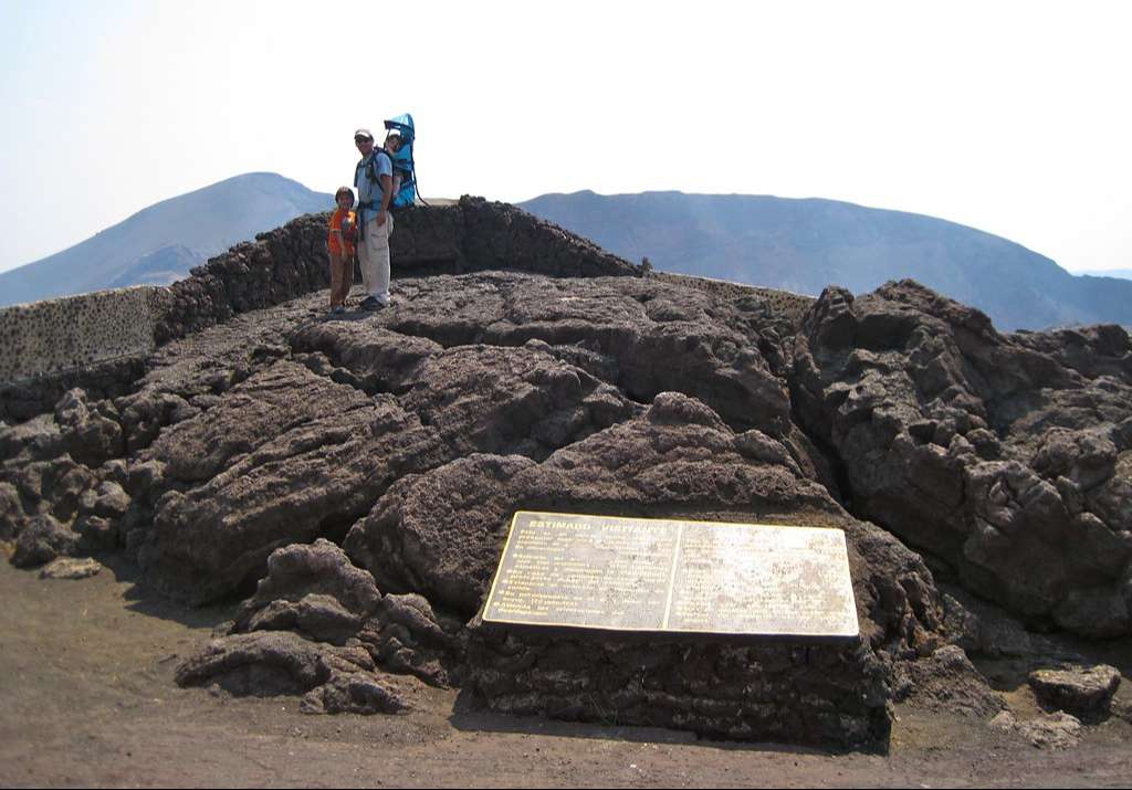 people stading at the top of masaya volcano in nicaragua