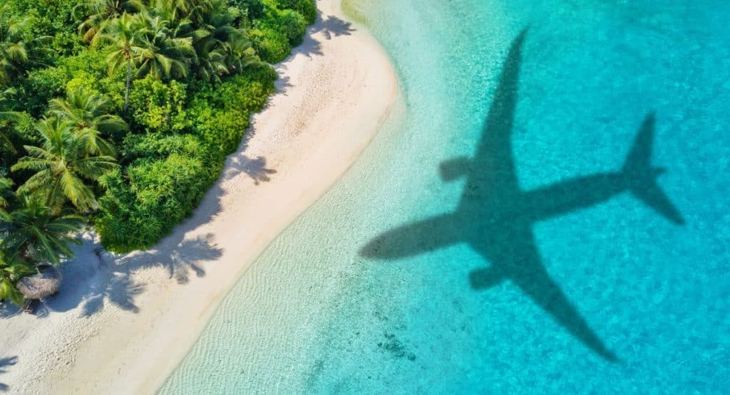 airplane shadow on the beach