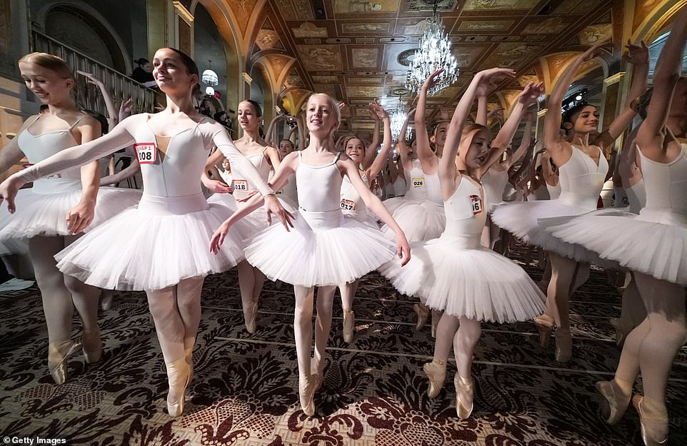 Tutus as far as the eye can see! HUNDREDS of young ballerinas descend upon New York's Plaza Hotel to smash Guinness World Record for the most dancers en pointe at the same